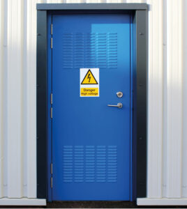 M2M2 door reading 'Danger High Voltage'.